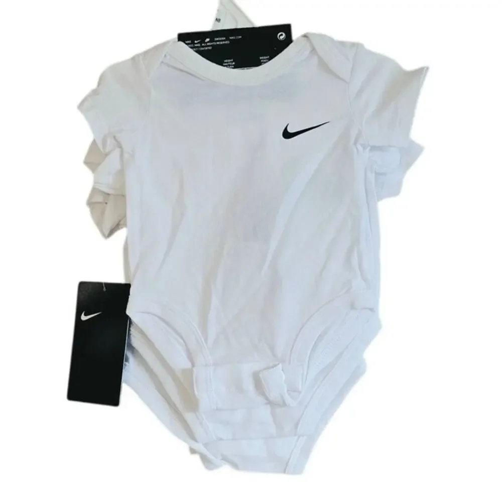 Nike baby 3-pack bodysuits size newborn